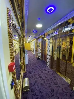 a corridor of a train with a purple carpet at Стаи за гости Топ Старс Смолян in Smolyan