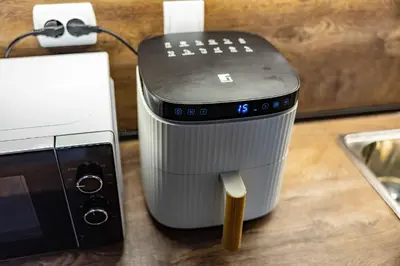 a router sitting on a counter next to a toaster at Bansko home with a Mountain view in Bansko