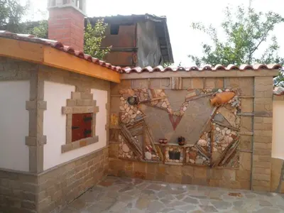 a building with a wall made out of bricks at Complex Diana in Cherven