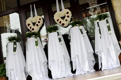 a group of white curtains in front of a door at Park Hotel Ribaritsa in Ribarica