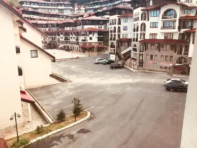 an aerial view of a parking lot in a city at Apartment 24 in Pamporovo
