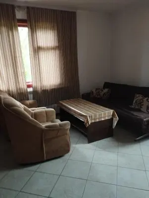 a living room with a couch and a table at Tolem in Borino