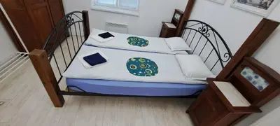 a staircase with two beds in a room at Modern and Old Base in Sofia