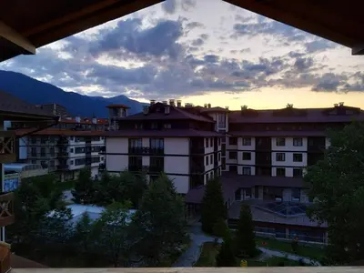 a view from the balcony of a building at Casual Apartment near Gondola & City Center - Neon in Bansko