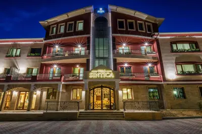 a large building with a sign that reads sintra at Villa Sintica in Sandanski
