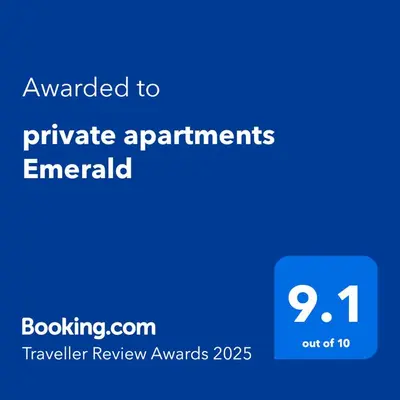 a blue screen with the text awarded to private apartments emerald at private apartments Emerald in Bansko