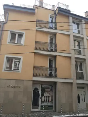 an apartment building with windows and balconies at Mini Sofia in Sofia