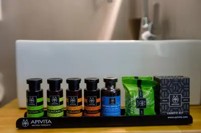 a group of four bottles of ink sitting on a counter at HOTEL FINIX CASINO in Kulata