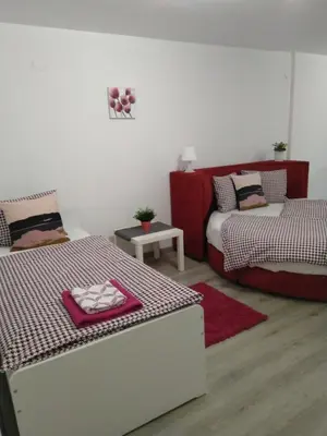 a living room with two beds and a couch at Sofia Peak in Sofia