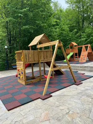 a set of childrens play equipment in a park at Balkan Hotel in Chiflik