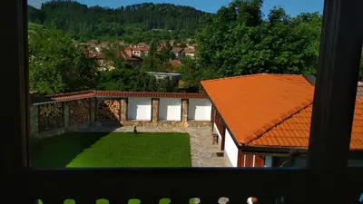 an aerial view of a house with a yard at Боримечковата къща in Kalofer