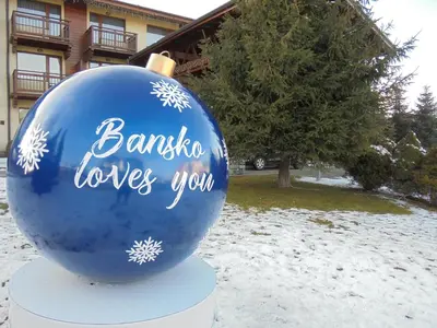 a blue ball with the words banquet loves you written on it at F307 Studio Aspen Golf Resort Bansko in Bansko