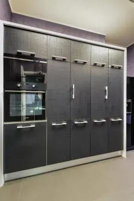 a row of lockers in a kitchen with a wall at Champs-Élysées Sofia 2-BDR, 2-BTHR Tsar Simeon Suite by Flat Mаnager in Sofia