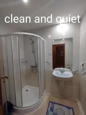 a bathroom with a shower and a sink at Borovets Hotel Villa Park in Borovets