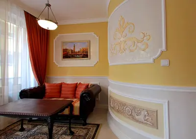 a living room with a couch and a table at Venice Apartments in Sofia