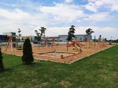 a park with a playground with a slide at Hotel Frigopan in Plovdiv