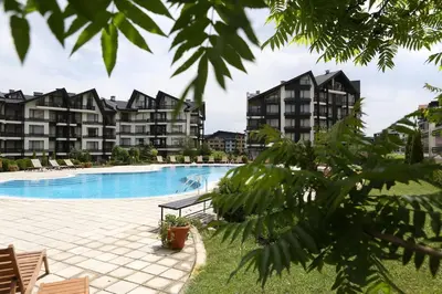 a swimming pool at a apartment complex at Aspen golf studio apartment D208 in Razlog