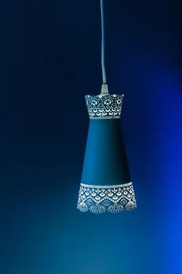a green christmasuble with white lace on a string at Beautiful best location apartment 
