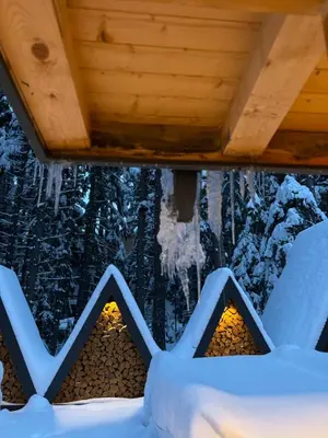 a room with icicles hanging from the ceiling at Algara hut in Panichishte
