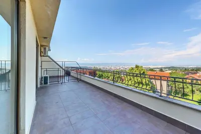 a balcony with a view of a city at Vitoshko Lale Hotel in Sofia