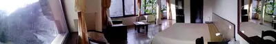 a view of a room with a hallway with windows at Villa Cherven in Teteven