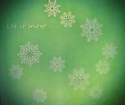 a green background with white snowflakes on it at Snow Apartment - Bansko in Bansko