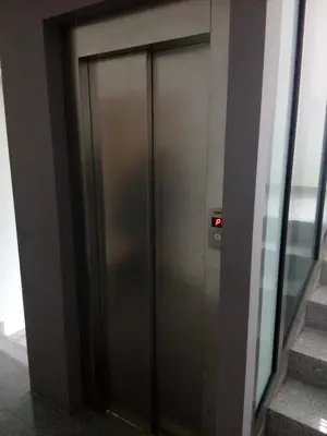 a elevator door in the side of a building at Студио Бижу in Hisarya