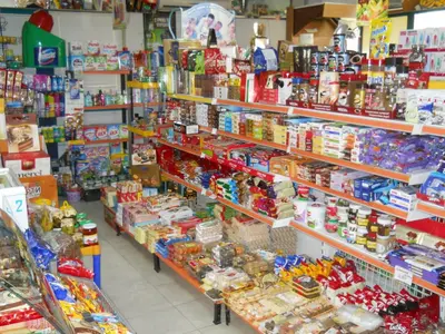 a store filled with shelves filled with food and other items at Hotel Orient in Blagoevgrad