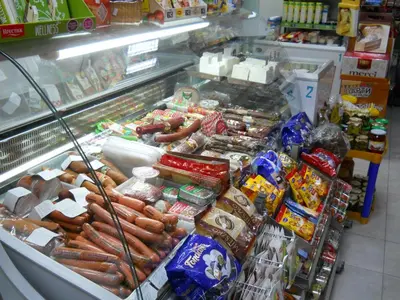 a display case in a store with hot dogs and other food at Hotel Orient in Blagoevgrad