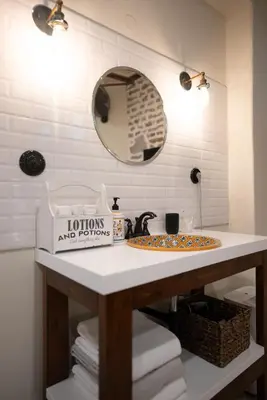 a bathroom with a sink and a mirror at 29A Guesthouse in Plovdiv