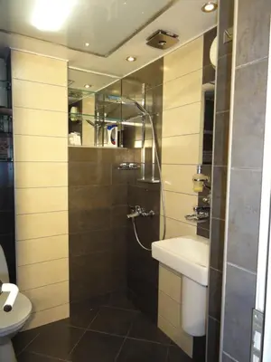a bathroom with a shower and a sink and a toilet at Apartment SOFIA LUX TOP CENTER in Sofia