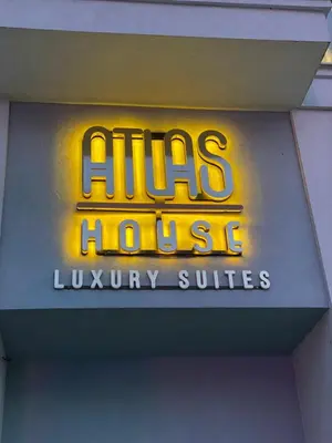 a sign for a lifts house luxury suites at ATLAS HOUSE Luxury Suites in Plovdiv