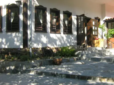 a building with stairs in front of a building with windows at комплекс ВОДОПАДА in Plovdiv