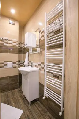 a bathroom with a sink and a mirror at Апартамент Радост Сандански in Sandanski