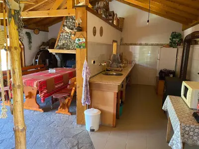 a kitchen with a sink and a counter in a room at вила Здравец in Yagodina