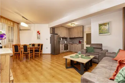 a living room with a couch and a table at GLORIOUS - 2-Bedroom apartment near Youth Hill by Flat Mаnager in Plovdiv