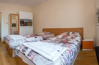 a bedroom with two beds in a room at GLORIOUS - 2-Bedroom apartment near Youth Hill by Flat Mаnager in Plovdiv