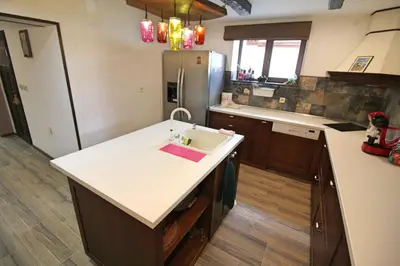a kitchen with a sink and a refrigerator at Ice Jewel Chalet, Bansko, 200 meters from the Gondola, 20 улица „Свети Иван Рилски“ in Bansko