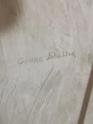 a letter with the words shine brighter written on it at Courthouse Apartments Slavi in Sofia