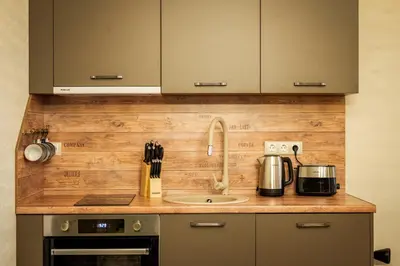 a kitchen with a sink and a counter top at Sofia Crown Life Apartment in Sofia