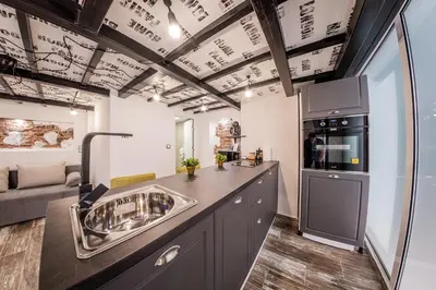 a kitchen with a sink and a counter top at Sofia Parter Life Apartment in Sofia
