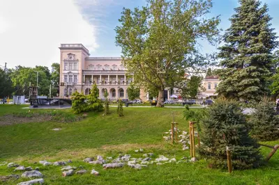 a park in front of a large building at CACAO Studio next to Crystal Garden and Russian Church by Flat Mаnager in Sofia