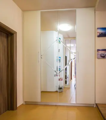 a glass pivot door in a room with a hallway at The Rocky House - Central & Private 2BDR by Flat Mаnager in Plovdiv