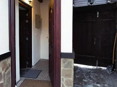 an entrance to a building with two doors and a doorway at Relax in Dobrinishte