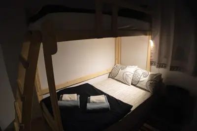 an overhead view of a bunk bed in a room at EskiZ - Our stone home in Chepelare