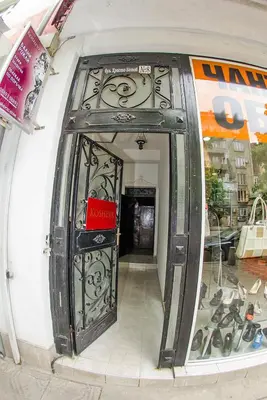 an entrance to a store with a door at Sofia Apartment in House 8 boulevard Hristo Botev in Sofia