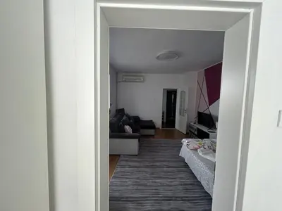 a view of a living room with a couch at Апартаменти Уют in Plovdiv