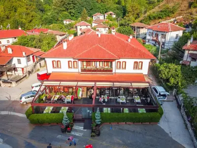 an overhead view of a building in a village at Zlaten Rozhen Family Hotel- Monument of Cultural Significance in Rozhen
