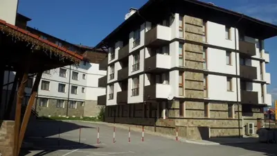 a large building is shown with cones in front of it at Luxury Green Apartment - up to 4 people in Bansko