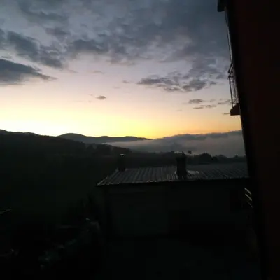 a view of the sunset from the roof of a house at Айрови in Sarnitsa